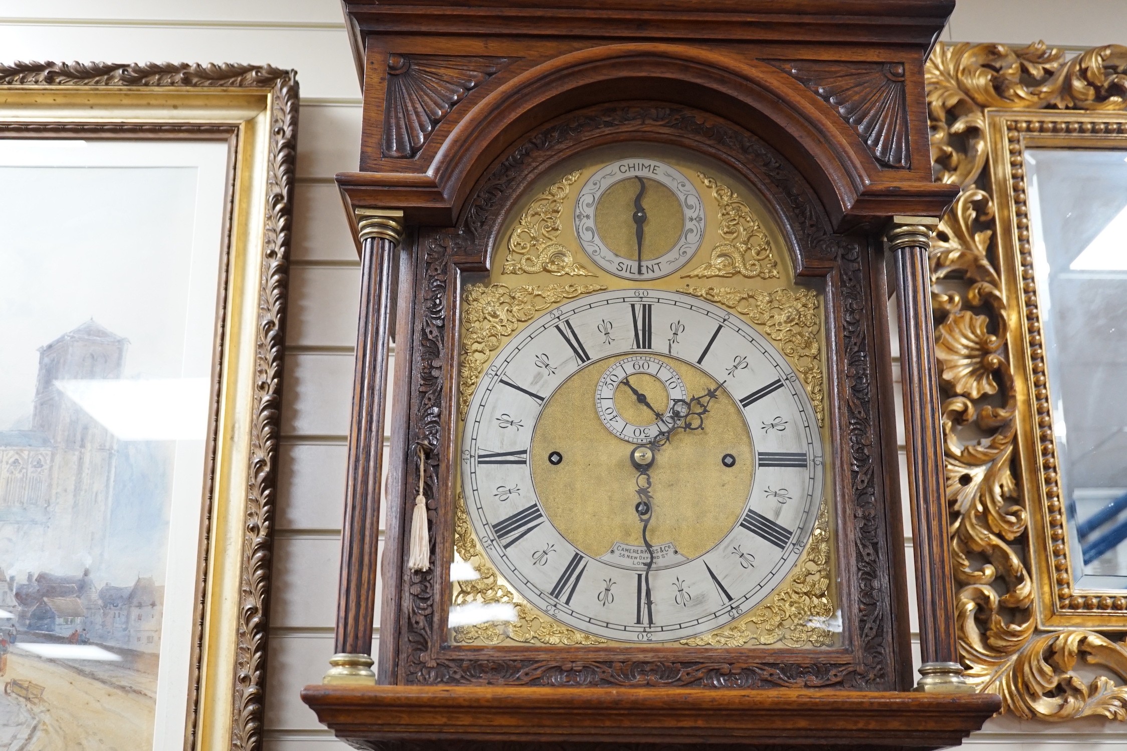 A late Victorian Camerer Cuss & Co carved oak chiming longcase clock, height 237cm *Please note the sale commences at 9am.